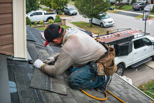 Professional Roofing technician working in East Livermore, ME